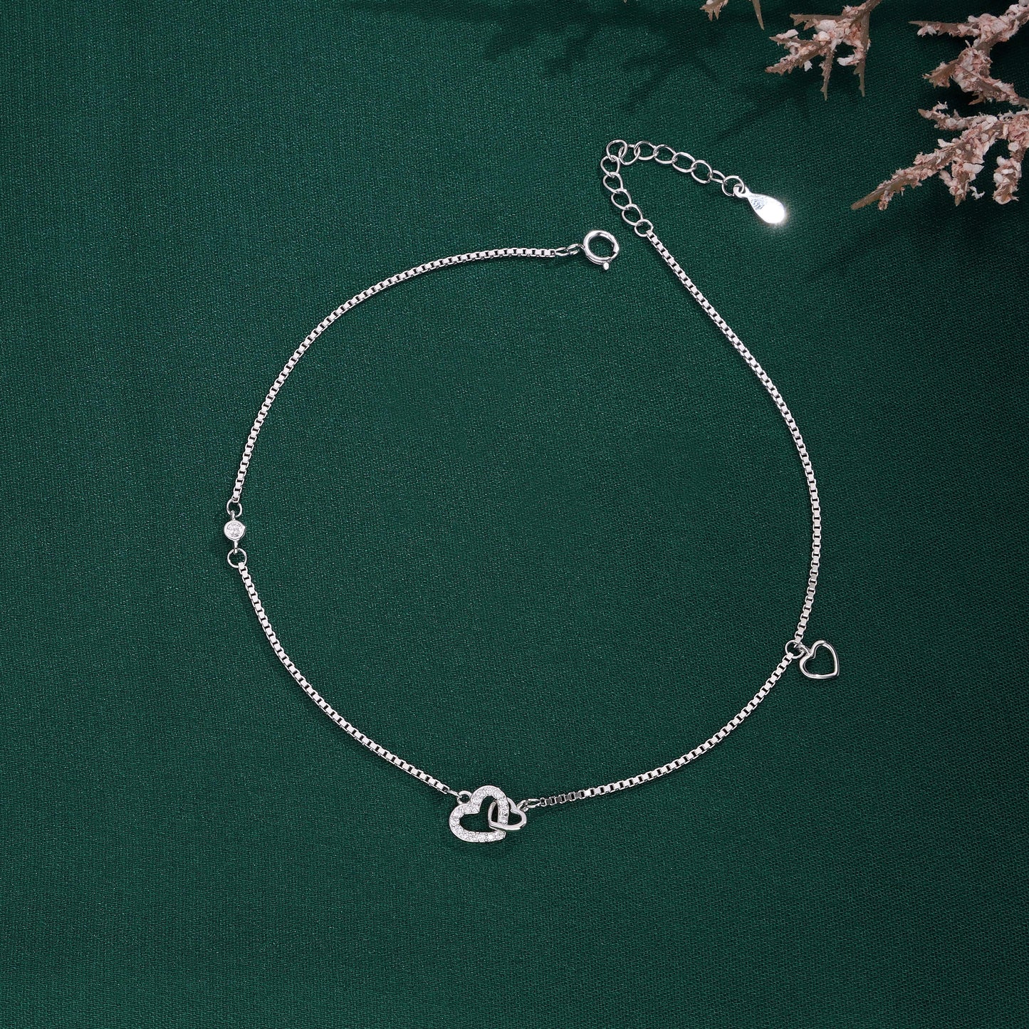 Silver heart charm anklet with sparkling stone accents