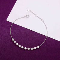 Sterling Silver String Of Pearls Bracelet