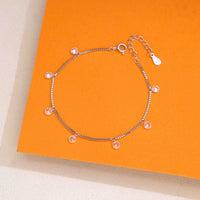 925 sterling silver charm bracelet with cubic zirconia drops, minimalist dangle design, adjustable women’s bracelet