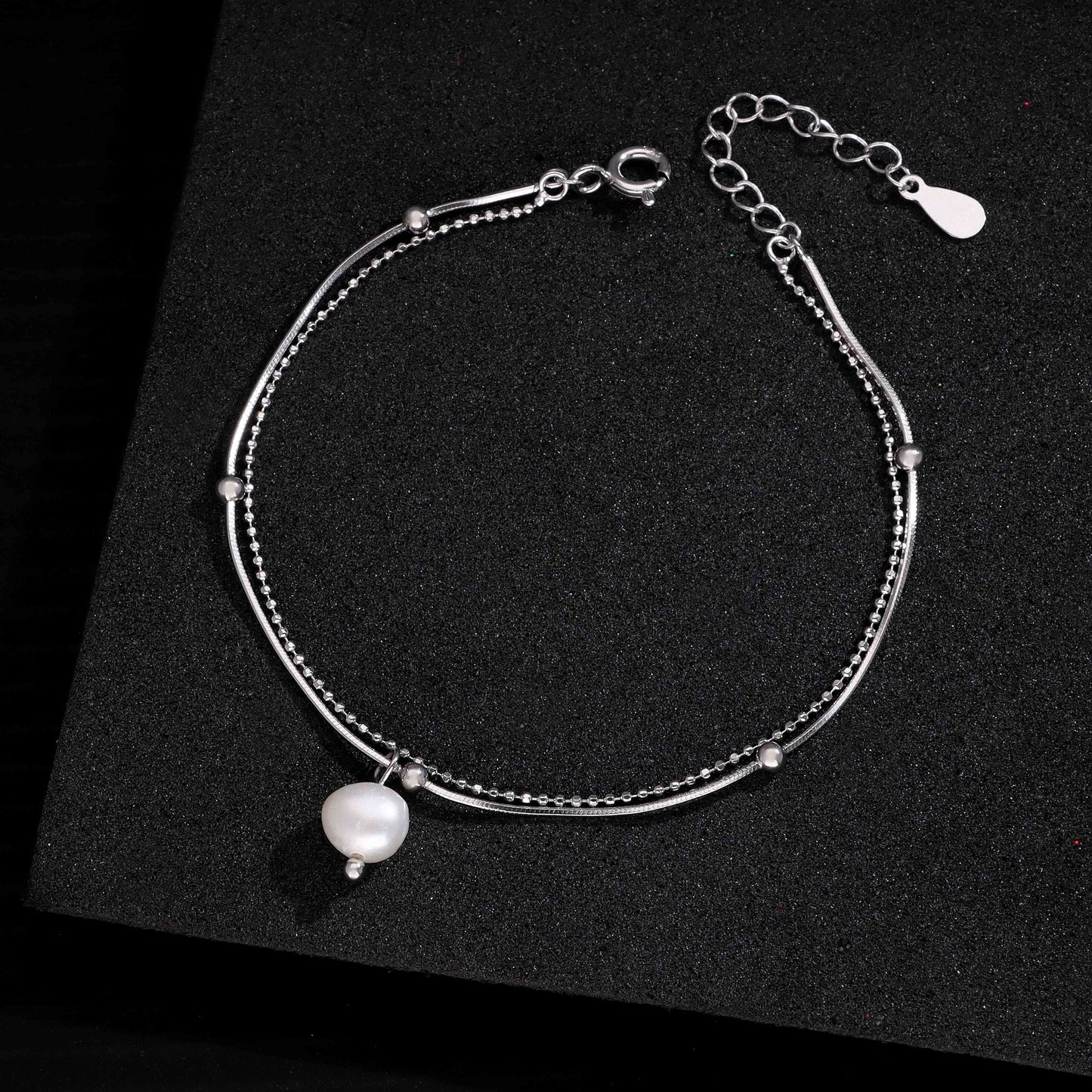 Silver tone layered chain bracelet
