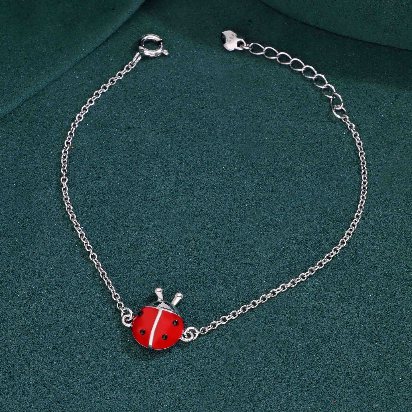 Sterling silver bracelet with red ladybug enamel