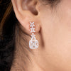 Bedazzling Zircon Baguettes & Blossoms Dangler Silver Earrings