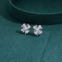 Elegant silver flower stud earrings with sparkling crystal petal