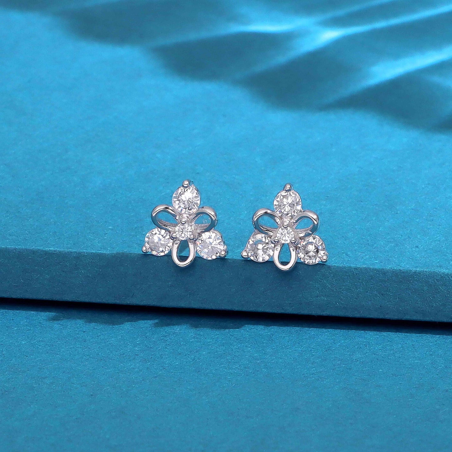 Silver flower stud earrings