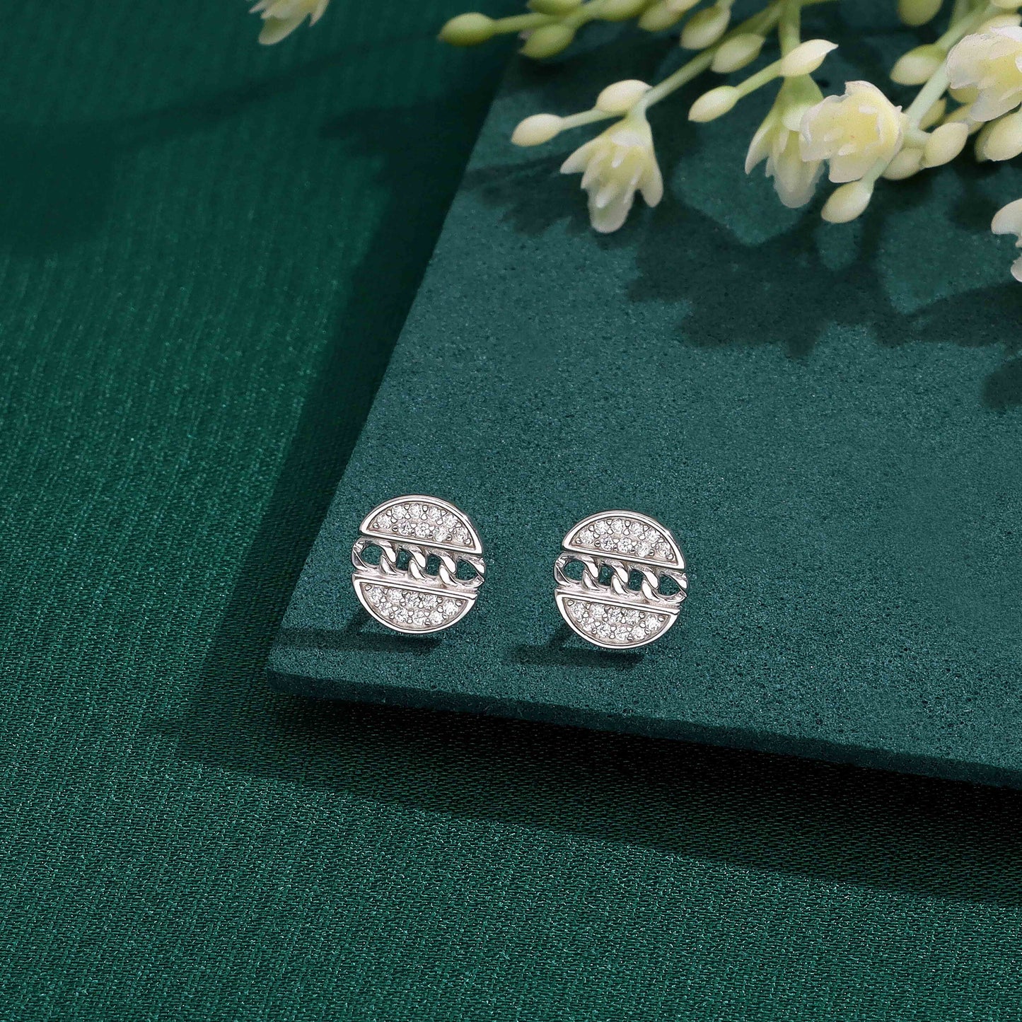 Sterling silver stud earrings with crystal embellishments