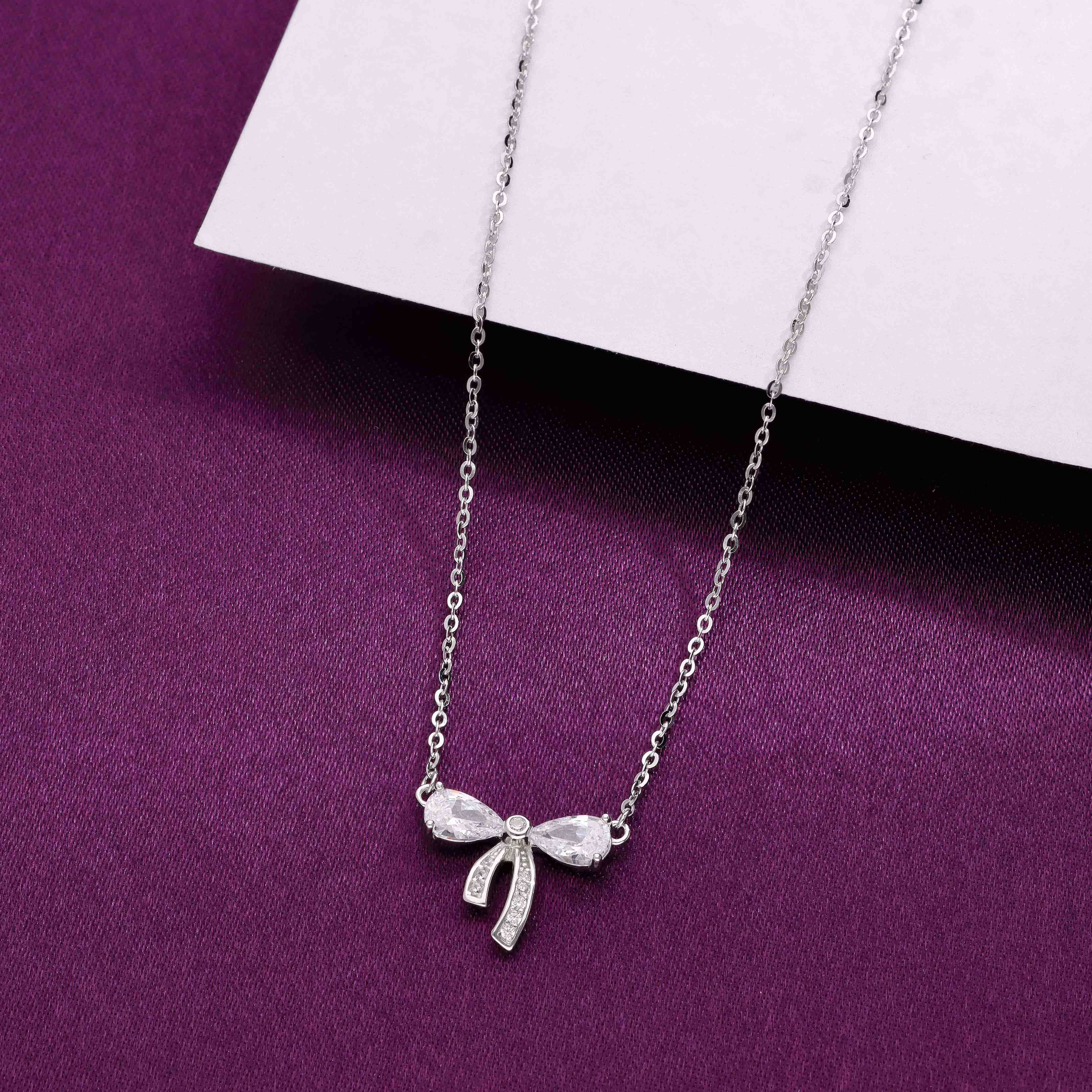 Sterling Lavender Zircon Studded Bow Necklace – Kai Jewel