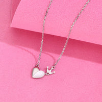 Sterling silver necklace with mother of pearl heart pendant and crown charm on chain – Kai Jewel