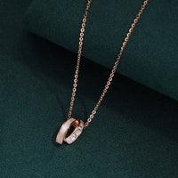 Rose gold double ring pendant necklace with mother of pearl