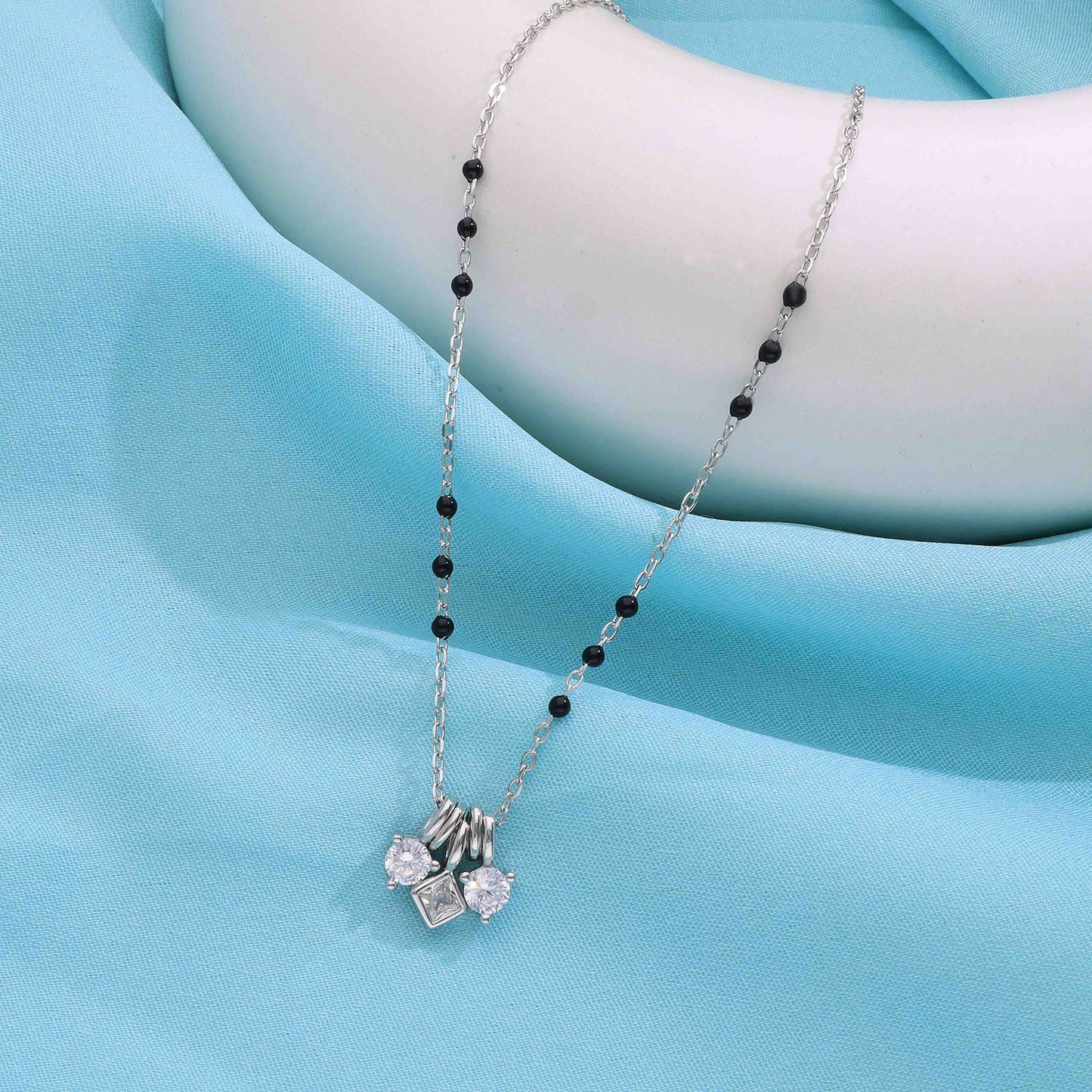 Sterling silver mangalsutra necklace with triple cubic zirconia charm