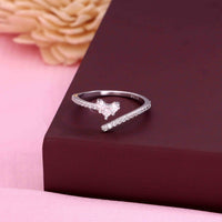 Heart-shaped diamond ring in sterling silver with delicate diamond accents