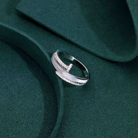 Sterling silver ring with pavé cubic zirconia in a modern split band and vertical bar design