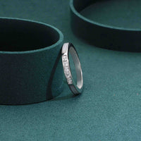 Sterling silver ring with princess-cut cubic zirconia stones