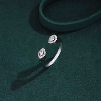 Twin teardrop adjustable silver ring with marquise-cut cubic zirconia stones