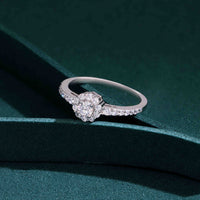 ring with round-cut center stone and pavé-set on band